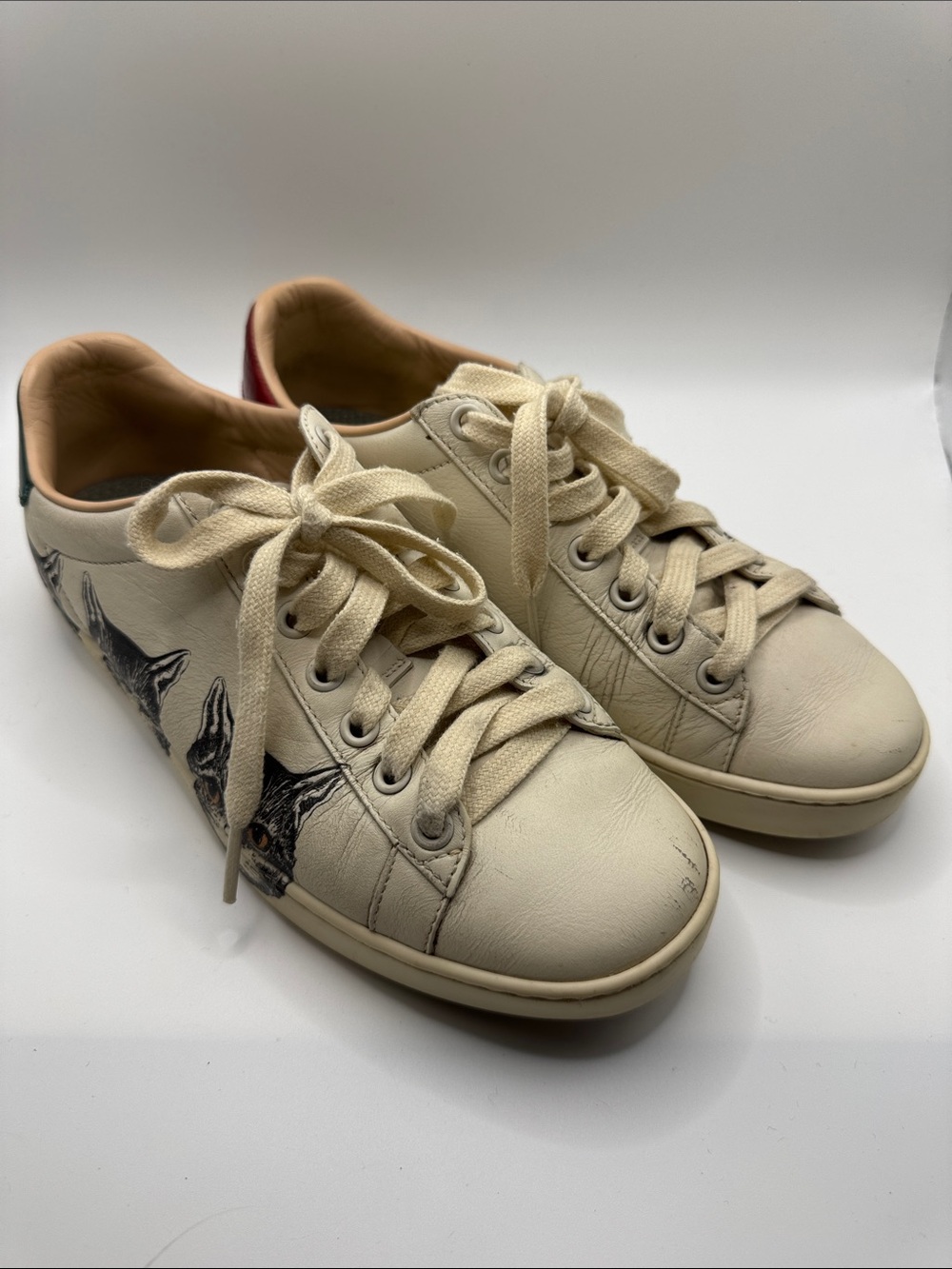 Gucci Off-White Leather Lace-Up Sneakers with Black Graphic